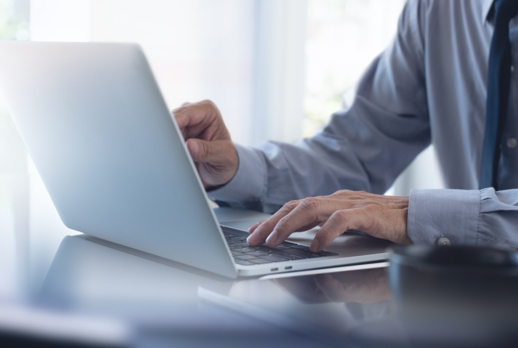 Businessman Working Laptop 1040x700